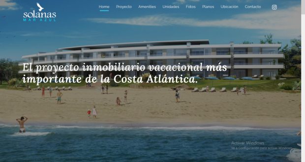 una playa con edificios altos y la leyenda "la inmobiliario vacacional mas importante de la Costa Atlantica"